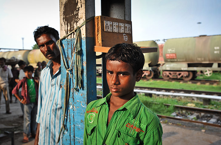 Child Slaves: Muntasin, 10, with his uncle Mohammed Hasib