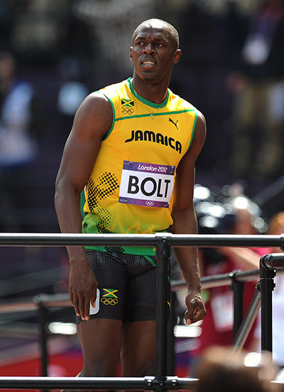 tom jenkins: Usain Bolt qualifies in the 100m heats