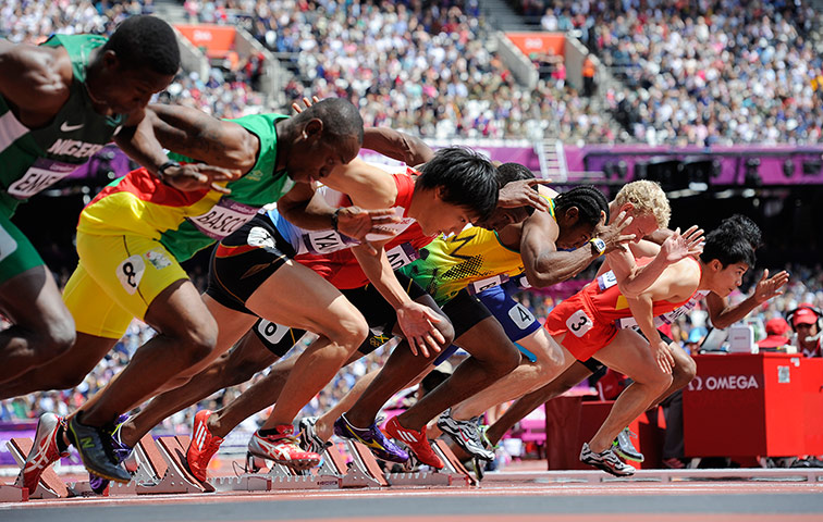 tom jenkins: Yohan Blake of Jamaica qualifies in the men's 100m heats