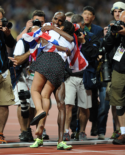 Tom Jenkins 4: Mo Farah of Britain celebrates victory in the men's 10,000m