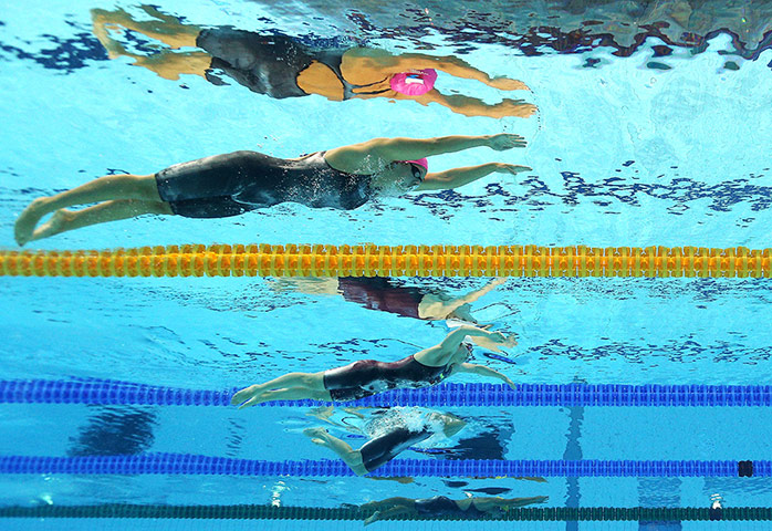 Reflections of swimming: Iuliia Efimova of Russia and Ye Sun of China - Women's 200m Breaststroke