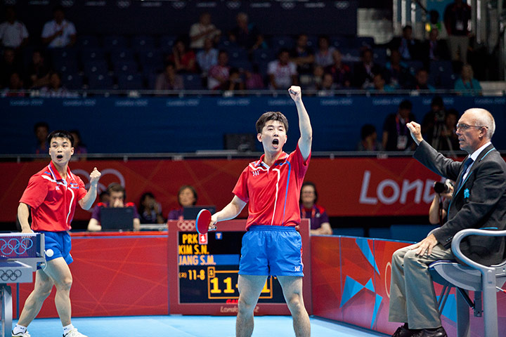 Table tennis: North Korea's SM Jang & SN Kim celebrate