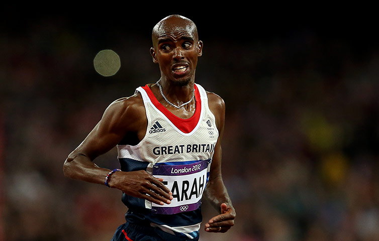 Mo Farah: Mo glances behind as he crosses the finishing line