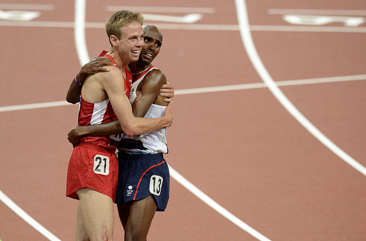 Mo Farah: Mo embraces his training partner and silver medalist Galen Rupp