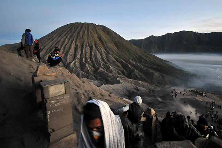 Mount Bromo: Worshippers climb the crater of Mount Bromo volcano bearing their offerings