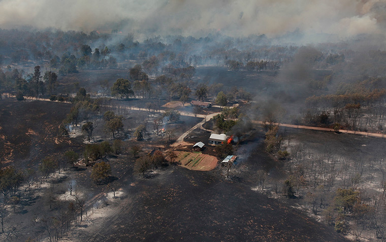 Oklahoma wildfires: A house is engulfed in flames near Drumright