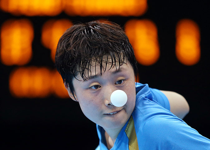 London 2012 Table Tennis: Tianwei Feng competes against Kim Kyungah in the Table Tennis 