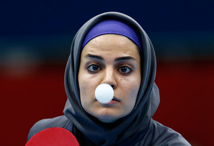 London 2012 Table Tennis: Neda Shahsavari against Olufunke Oshonaike during their table tennis match