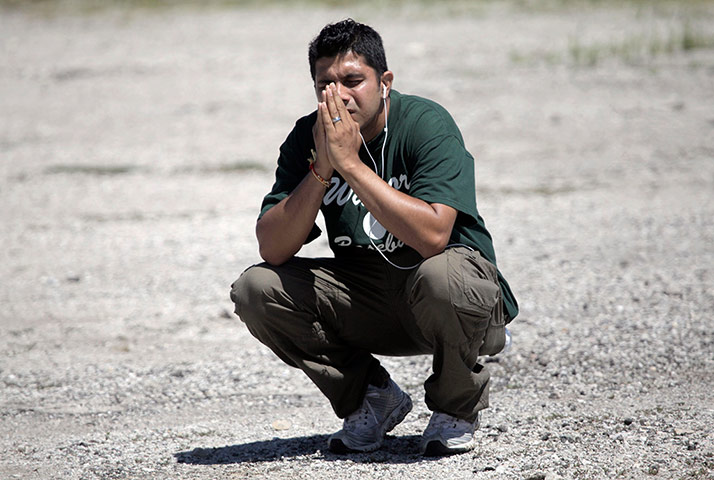 Sikh Temple Shooting USA: A family member waits to hear about loved ones inside the Temple