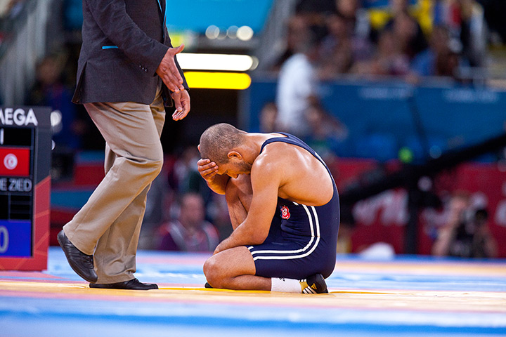 Greco Roman wrestling: Tunisian wrestler Zied Ayt Okrame is despondent after losing his match 