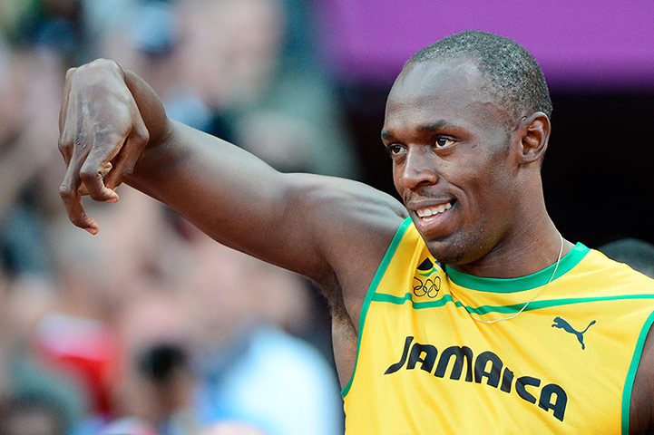 Bolt's Ticks: Jamaica's Usain Bolt gestures prior to the race