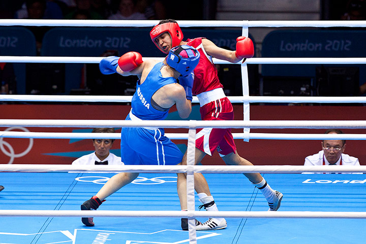 Women's boxing: New Zealand's Alexis Pritchard and Sofya Ochigava of Russia mix it up