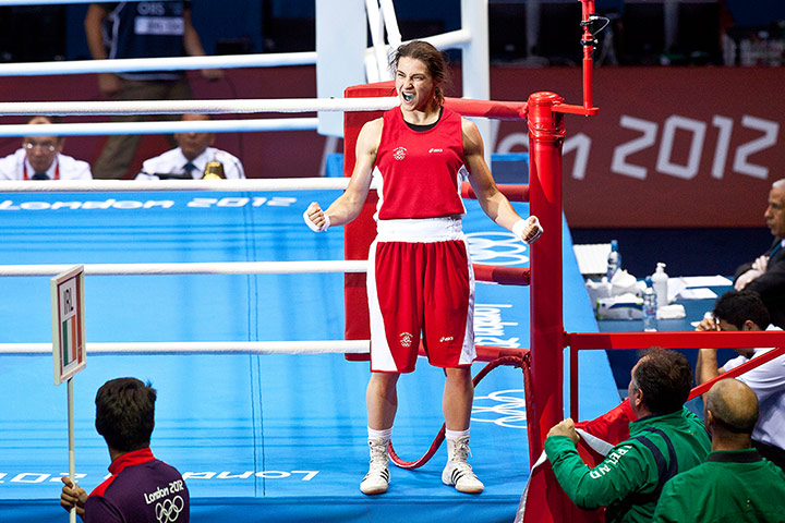 Women's boxing: Katie Taylor celebrates her 26-15 win 