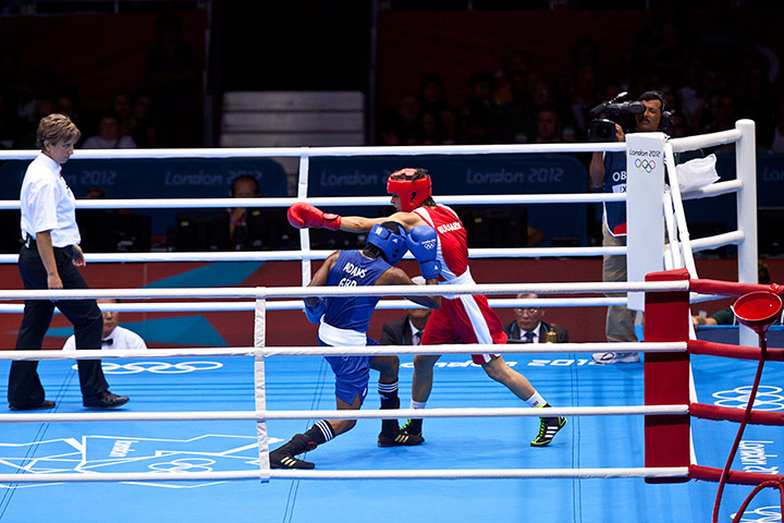 Women's boxing: Petrova misses with her left which leaves her open to one from Adams