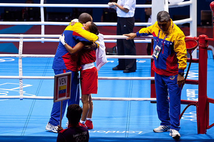 Women's boxing: Venezuela's Karina Magliocco receives a commiseration hug