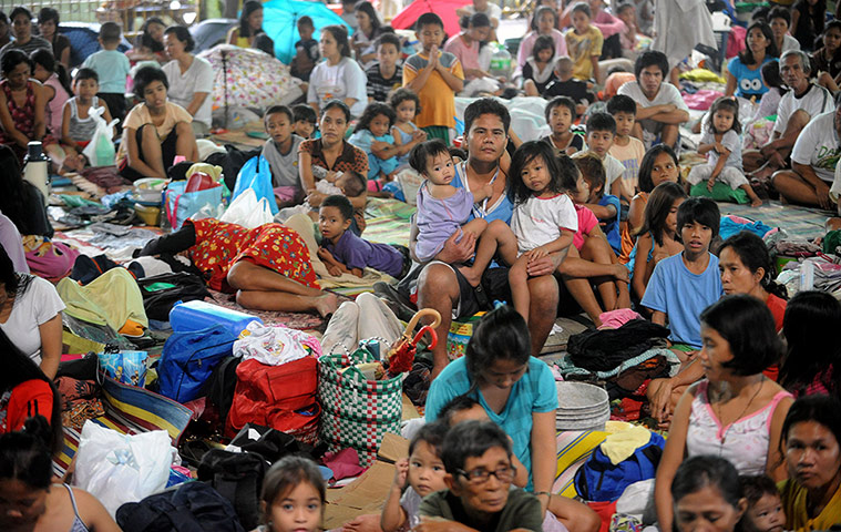 Floods in Manila: TOPSHOTS This general view shows a group