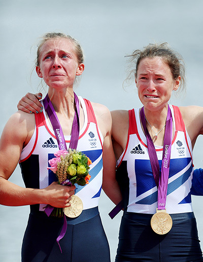 Winners and losers: Sophie Hosking and Katherine Copeland celebrate with their gold medals