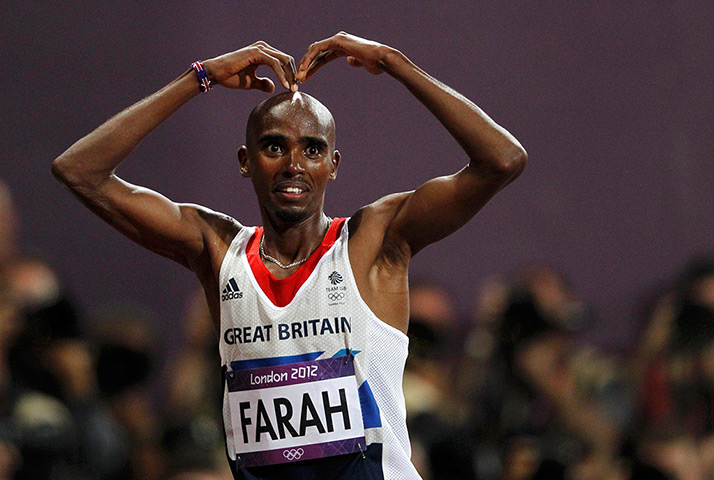 Winners and losers: Britain's Mo Farah reacts after winning the men's 10,000m final