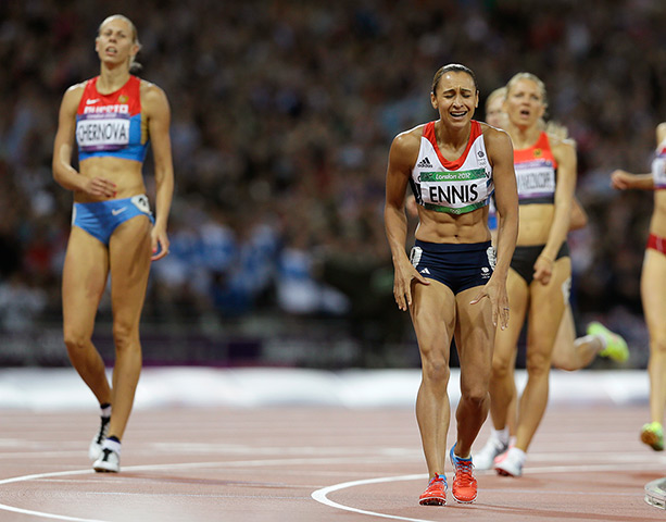Winners and losers: Jessica Ennis reacts as she wins gold following the 800-metre heptathlon