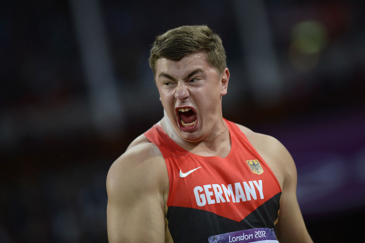 Winners and losers: Germany's David Storl reacts as he competes in the men's shot put final