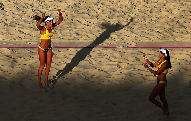 Winners and losers: Talita Rocha and Maria Antonelli of Brazil  Women's Beach Volleyball