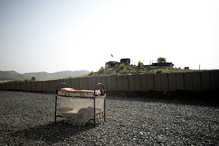 24 hours: Buwri Tana District, Afghanistan: An Afghan uniform police bunk bed