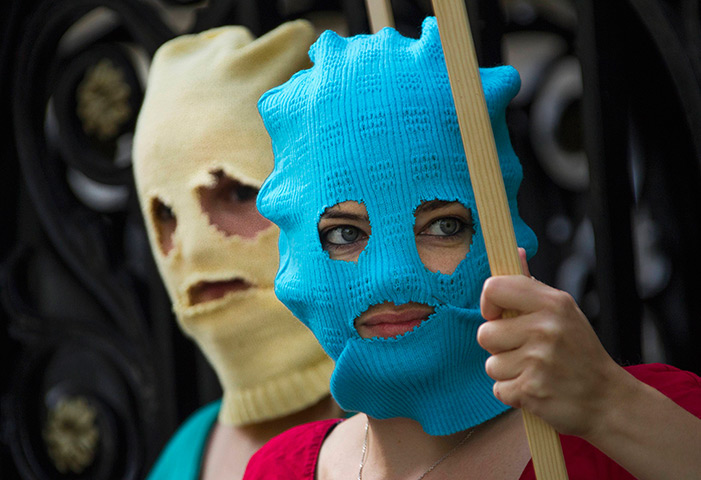 24 hours: Berlin, Germany: Protesters wear balaclavas in the style of the Pussy Riot