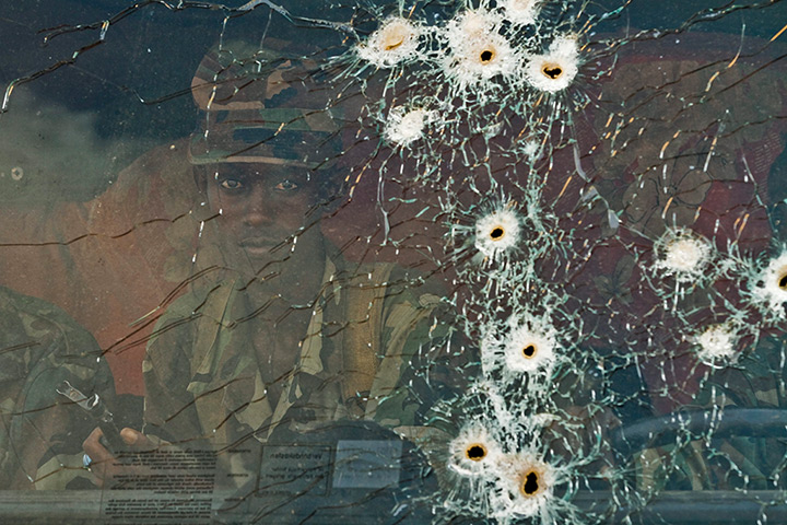 24 hours: Afgoye district, Somalia: An African Union soldier through a windscreen