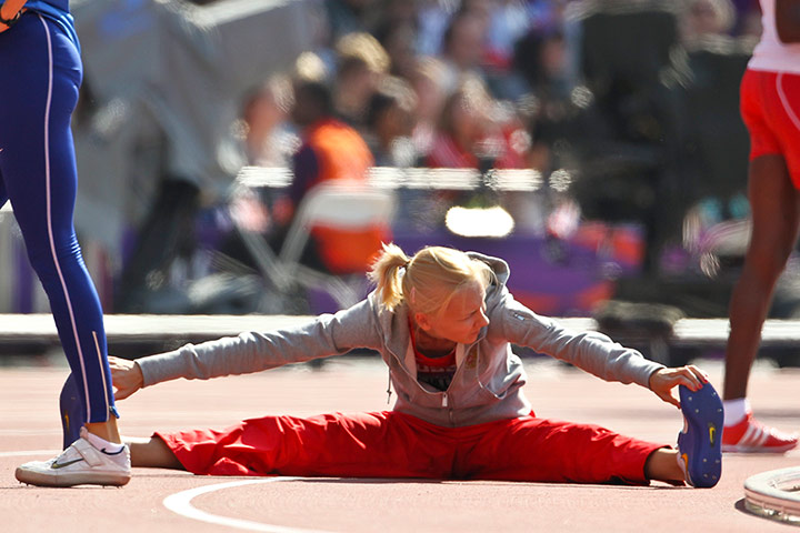 tony high jump: Ana Simic of Croatia stretches before her jump