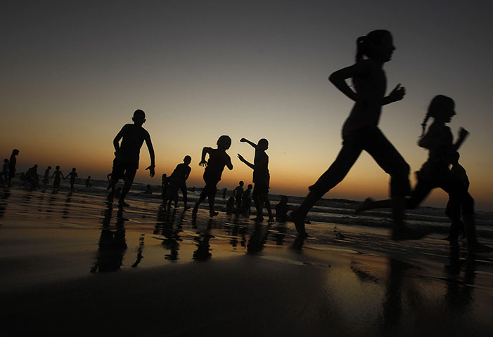 24 hours: Palestinians enjoy an evening at the beach