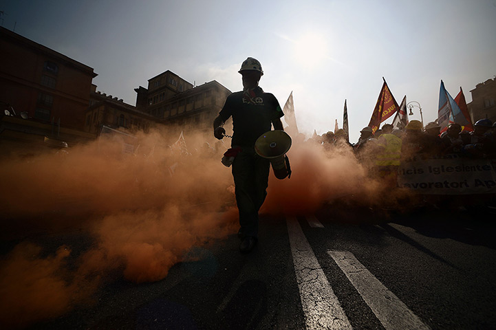 24 hours: Rome, Italy: Employees from Alcoa take part in a demonstration