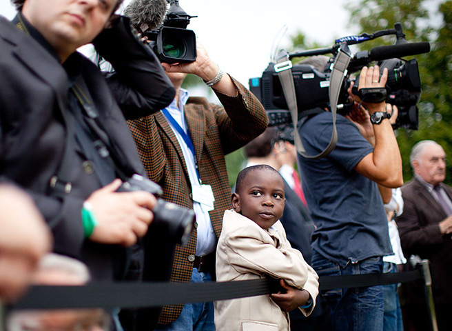 24 hours: Berlin, Germany: A boy at the German President's residency