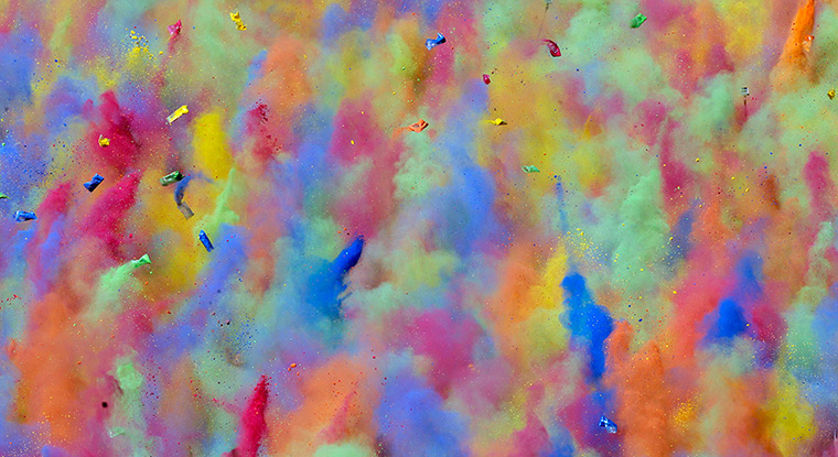 24 hours: Munich, Germany: People throw coloured powder during the Holi Festival 