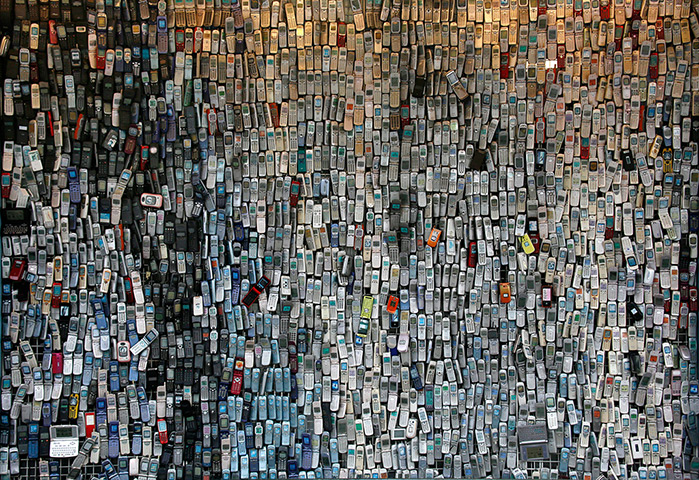 24 hours: Tokyo, Japan: An electronics shop with more than 6,000 mobile phones