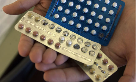 Contraceptive pills are held in their blister packaging