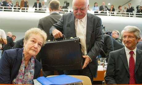 Peter Gauweiler (C) of the German Christian Social Union joins fellow petitioner of the ESM, Herta Daeubler-Gmelin (L) and lawyer Dietrich Murswiek (R)  inside the courtroom of the Federal Constitutional Court in Karlsruhe, southwestern Germany, on September 12, 2012 prior to the final ruling on the European Stability Mechanism (ESM) bailout fund. 