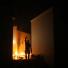 Benghazi protest: A protester reacts as the U.S. Consulate in Benghazi is seen in flames