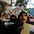 Benghazi protest: An Egyptian protester holds a copy of the holy Qu'ran