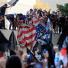 Benghazi protest: Protesters destroy an American flag from the US embassy in Cairo 