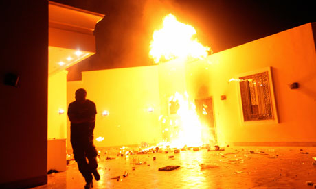 The U.S. Consulate in Benghazi is seen in flames during a protest