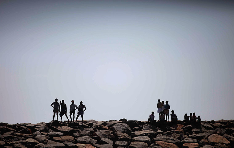 24 Hours: Kudankulam, India: Fishermen watch a protest