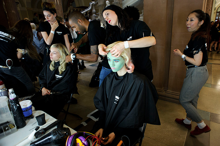24 hours: London, England: A model is made up before the Vivienne Westwood