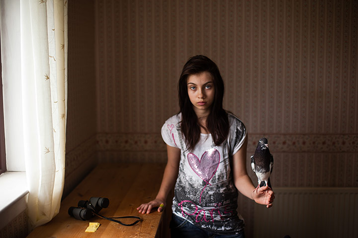 Scottish pigeons: Sinead Wilson, 11, stands with one of her favourite doos