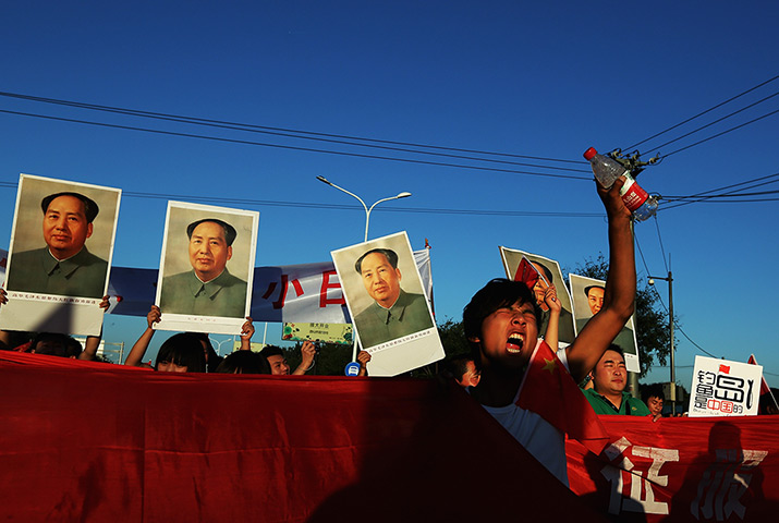24 hours in pictures: Chinese protestors stage an anti Japan rally outside the Japan Embassy
