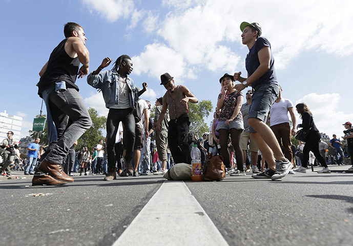 Week in Music: People dance in the streets of Paris during the 14th Techno Parade