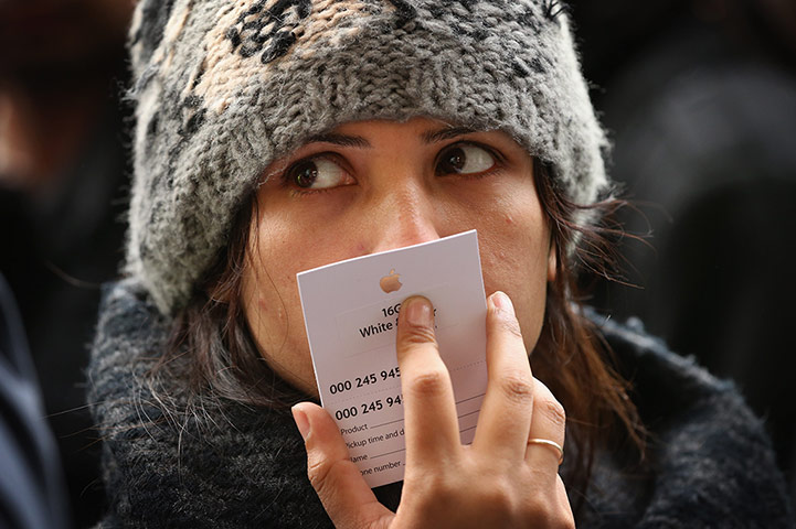 iPhone 5 on sale: London, England: A woman outside the Apple store in Covent Garden