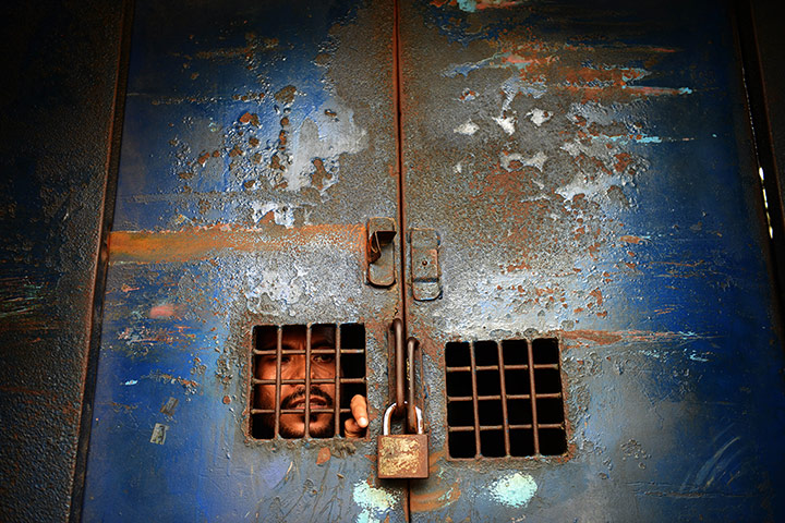 24 Hours: An activist looks out of a prison van in Dhaka, Bangladesh