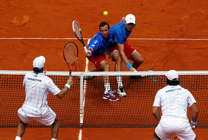 Best of week: Stepanek of Czech Republic plays a shot next to Berdych 