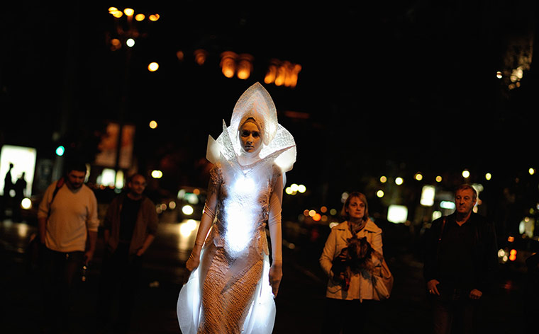 24 hours: Sofia, Bulgaria: An artist takes part in Luxlumina light performance