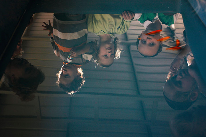 24 hours: Ashdod, Israel: Goldfish swim by ultra-Orthodox Jewish boys